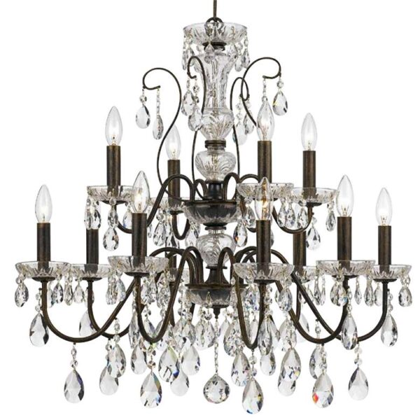 Image of a Butler 12 Light English Bronze Crystal Chandelier. The chandelier is made of metal and crystals and has a cascading design. It is hanging from the ceiling of a room.