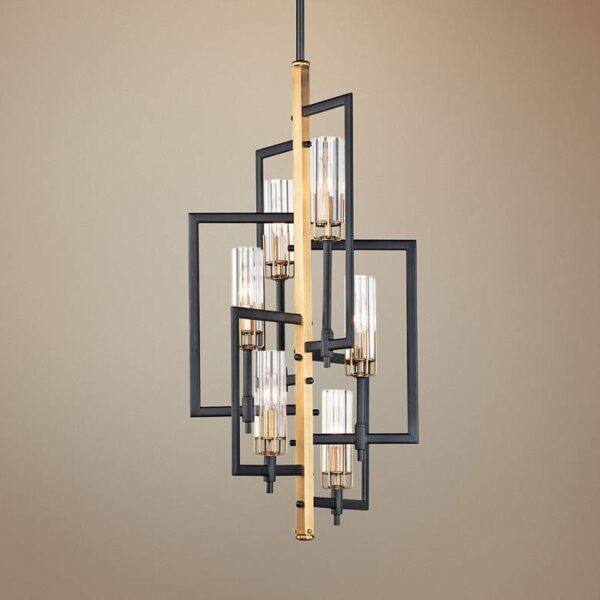 A black and gold chandelier hanging from the ceiling.