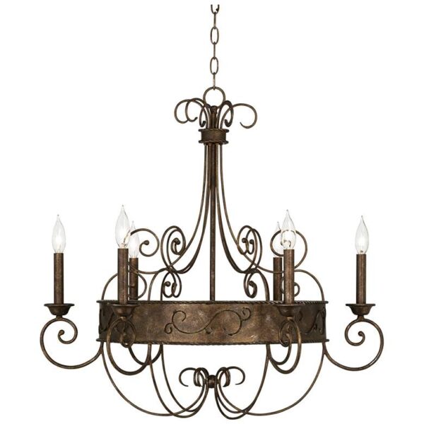 A rustic chandelier with six candle sleeves made of wrought iron.