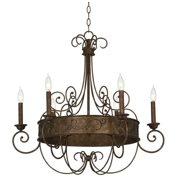 A wrought iron chandelier with five candles. The chandelier is hanging from a chain and is suspended above a white background. The candles are burning, creating a warm and inviting glow.