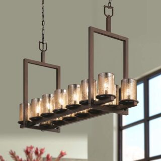 A product image of a Justice Design Group Fusion 14 Light 1 Tier Chandelier. The chandelier is made of crystals and has a round base. It is hanging from the ceiling in a kitchen.