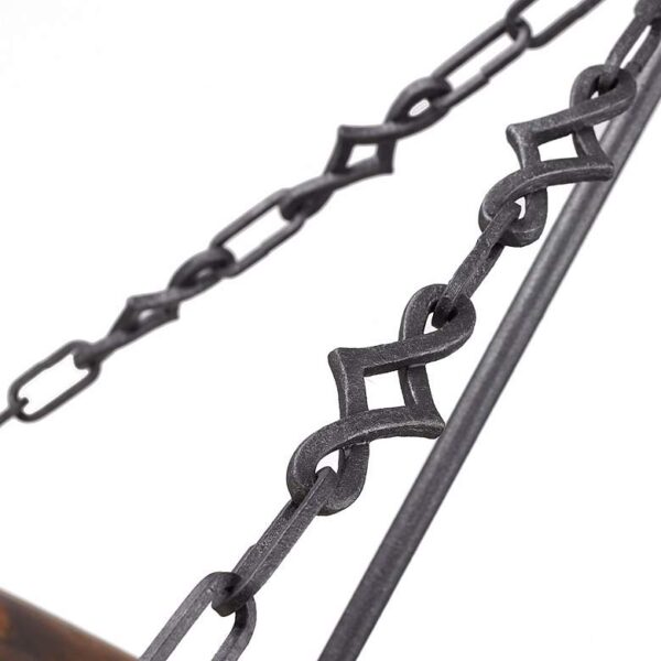 A close-up of a metal chain on a white background. The chain is made of small, interlocking links. It is shiny and reflective.