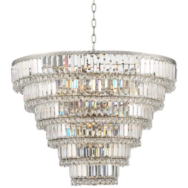 A large chandelier made of crystals hanging from the ceiling in a room. The chandelier has a round base and is made up of many small crystals. The crystals are arranged in a symmetrical pattern.