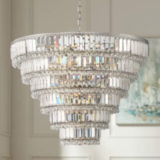 A large chandelier made of crystals hanging from the ceiling in a room. The chandelier has a round base and is made up of many small crystals. The crystals are arranged in a symmetrical pattern