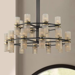 A product image of a Stiffel Palais 48" Wide Champagne Glass 24-Light Chandelier. The chandelier is made of champagne glass and has a round frame. It is hanging from the ceiling in a dining room.