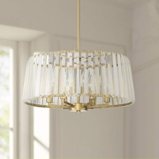 Modern chandelier with soft gold finish and clear crystal accents