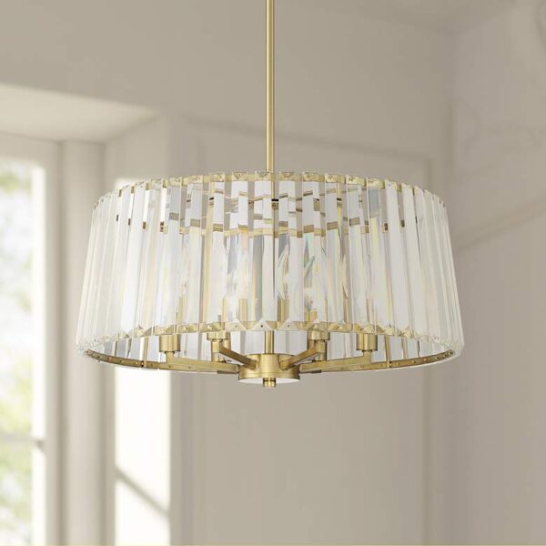 Modern chandelier with soft gold finish and clear crystal accents