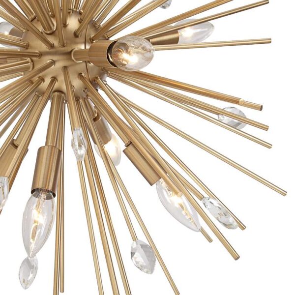 A close-up of a gold chandelier with starburst design. The chandelier has multiple golden rods extending from a central sphere in every direction, creating a starburst-like shape.