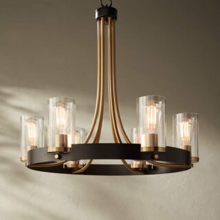 A luxurious chandelier with a black metal frame and clear glass shades, illuminating a room.